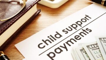 Child support payments written on a document.
