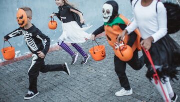 Children trick-or-treating during Halloween. Halloween security and safety tips.