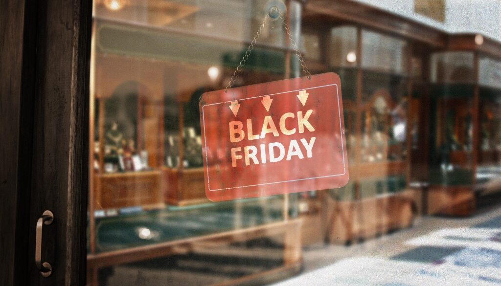 Retail store with Black Friday sign on front door.