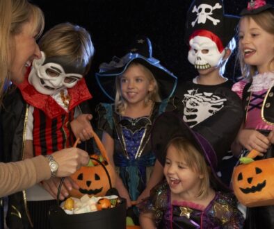 Children in Halloween costumes trick-or-treating.