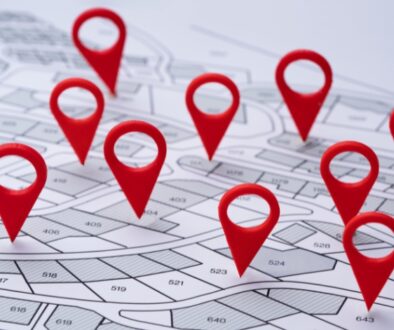 Sectioned map with Red Pins in various locations.